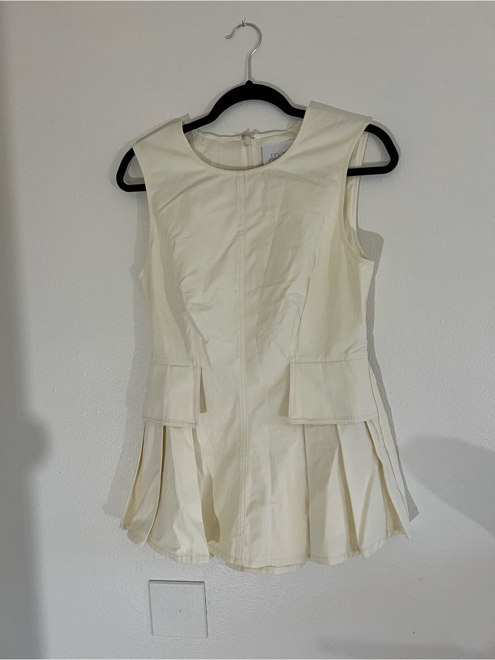 Sleeveless Cream Peplum Tunic Top